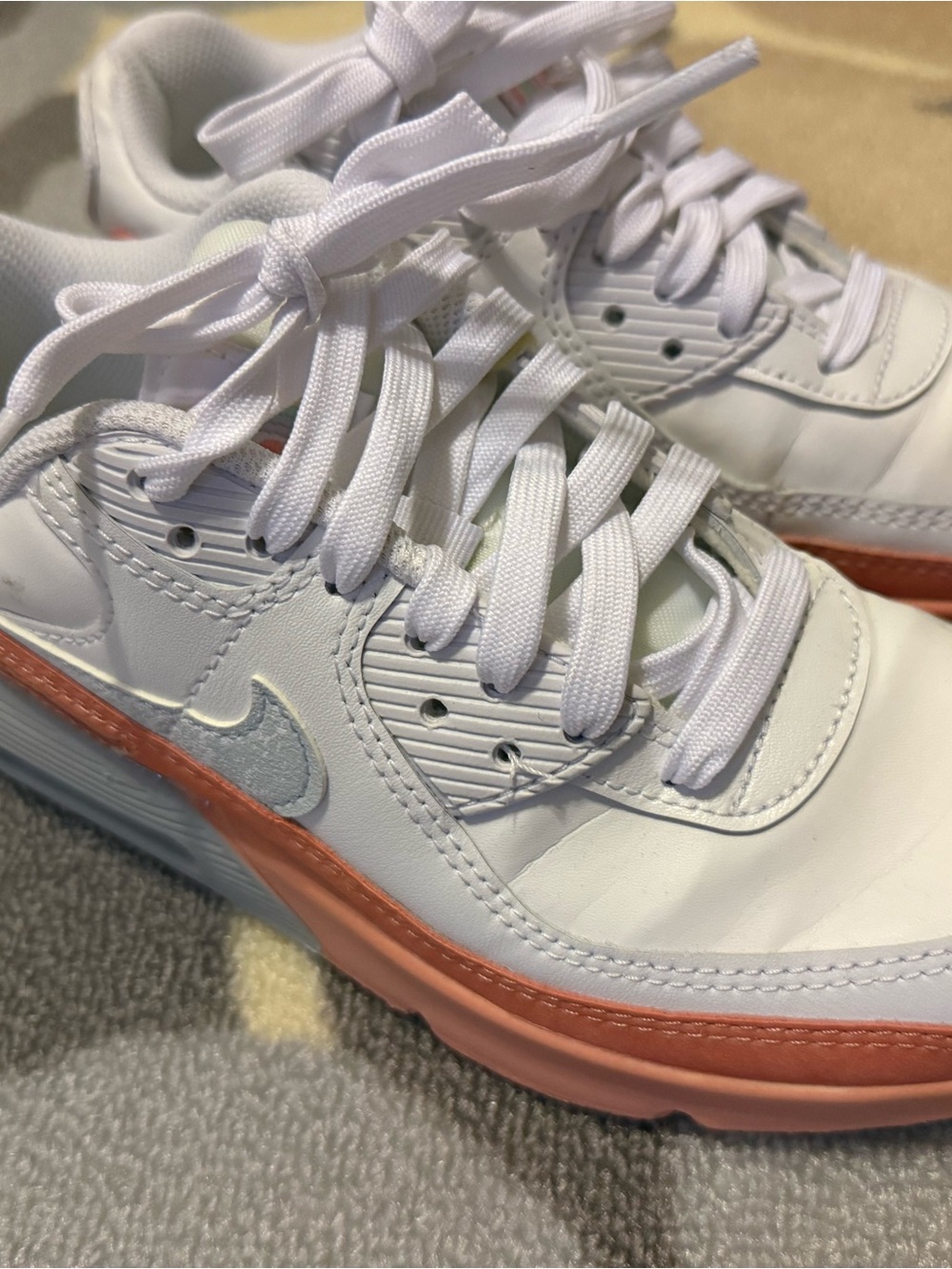 Nike White Mesh Kids' Sneakers with Coral Swoosh Accent